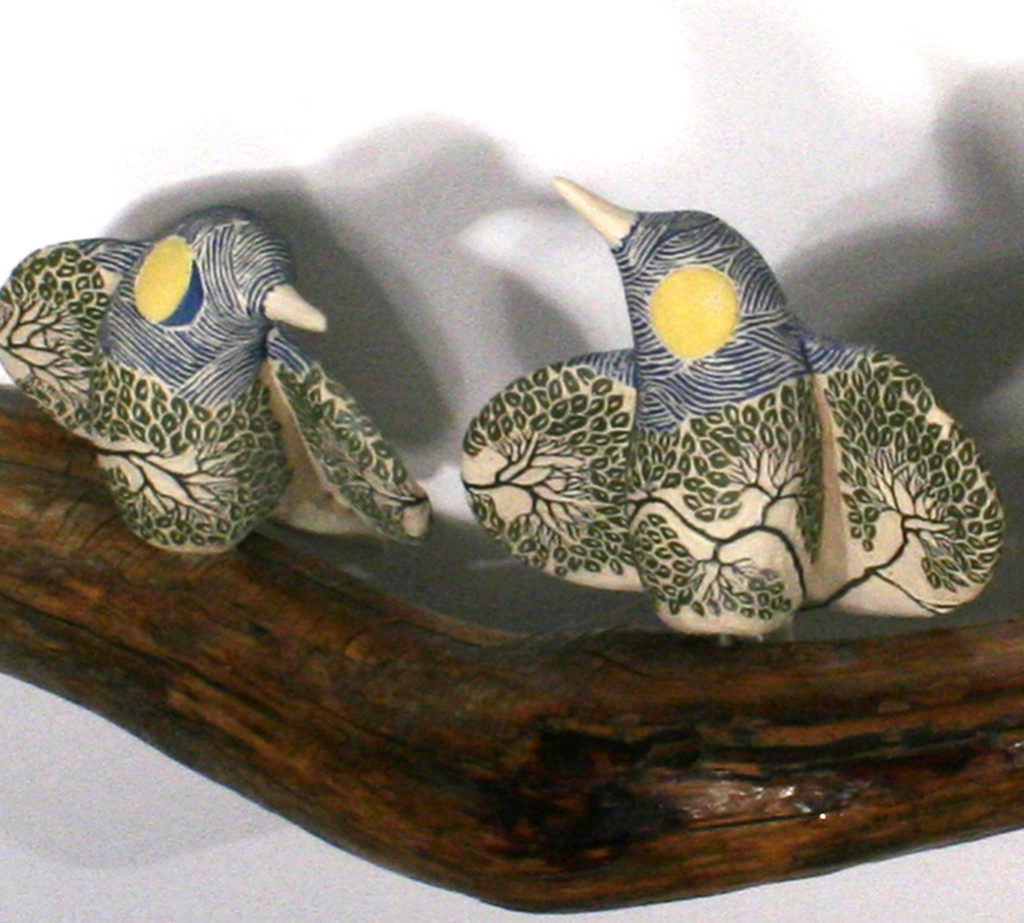 cathy weber - art - clay - woman - montana - ceramic - porcelain - bird - red wing - phases - forest - carved - moon - tree