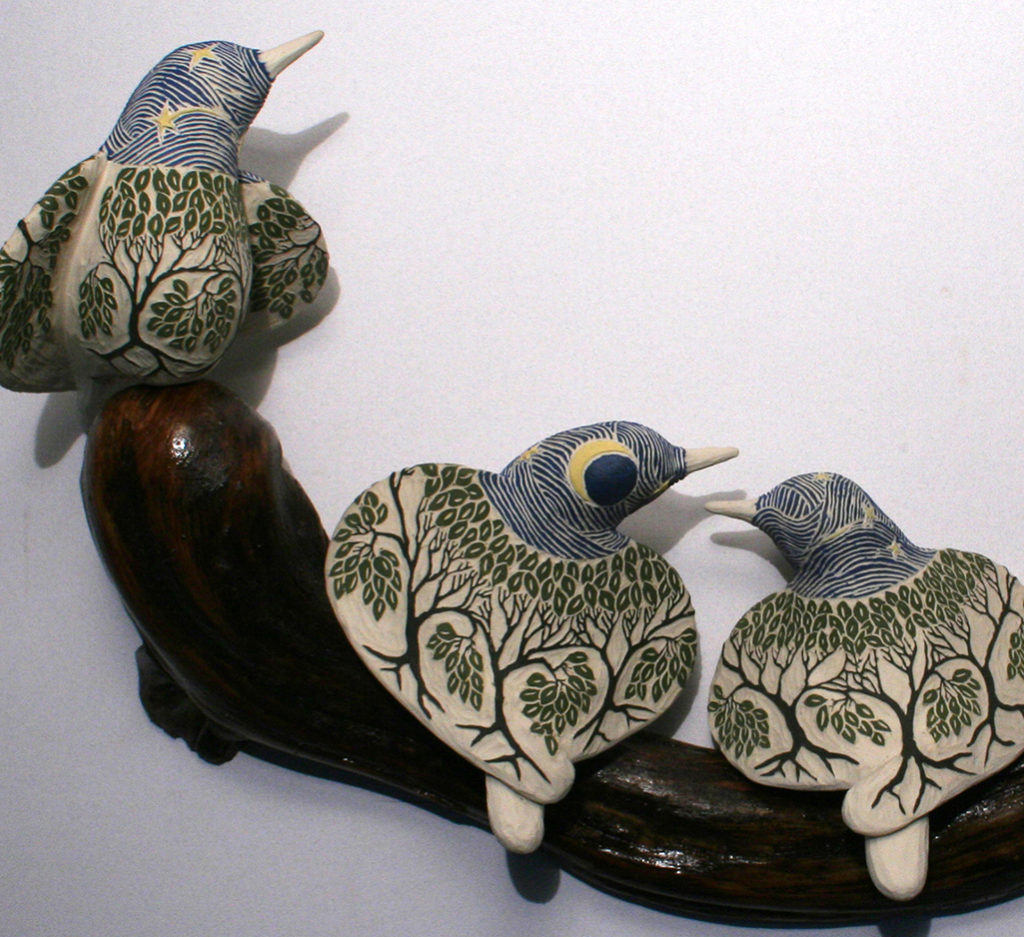 cathy weber - art - clay - woman - montana - ceramic - porcelain - bird - red wing - phases - forest - carved - moon - tree